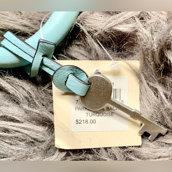 Sold🚨Fossil Turquoise Ice Parker Laptop Back pack w/ top Handle & Fringe design - Picture 13 of 13